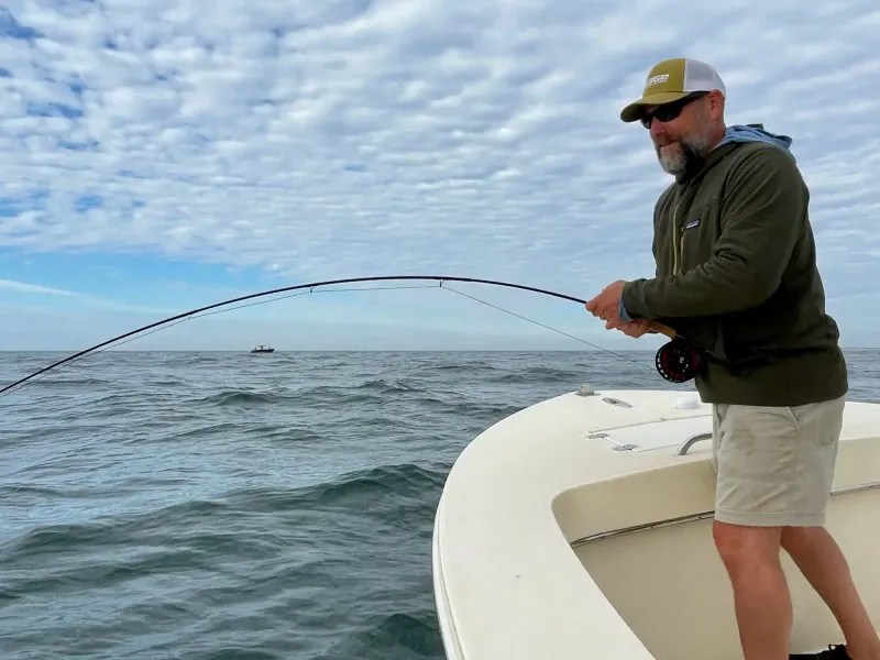 Marcus Webb fishing guide on a charter boat at West End Roatan Honduras
